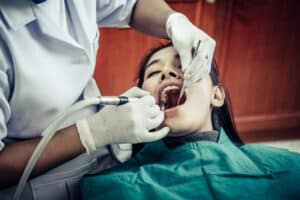 Patient receiving emergency dental care
