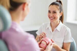 Patient consulting with dentist about dental implants in Livermore